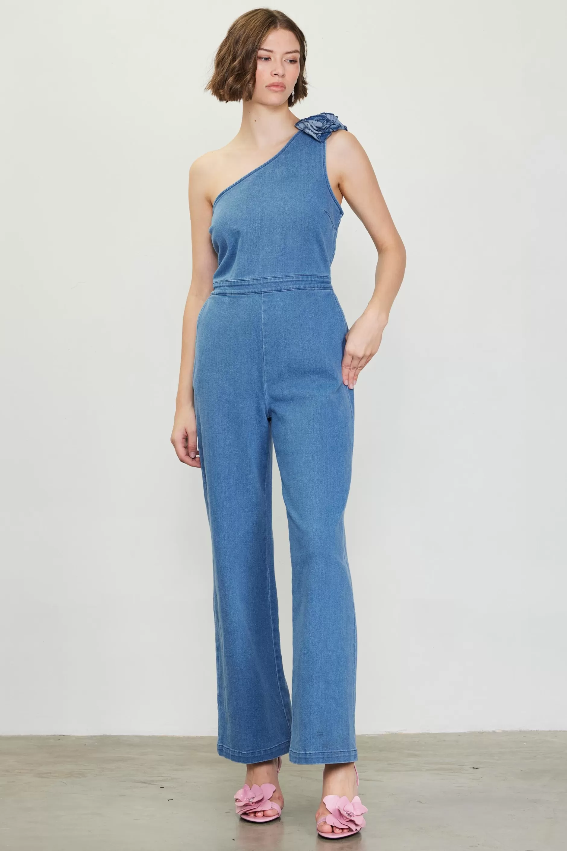 SKIES ARE BLUE One Shoulder Denim Jumpsuit with Rosette