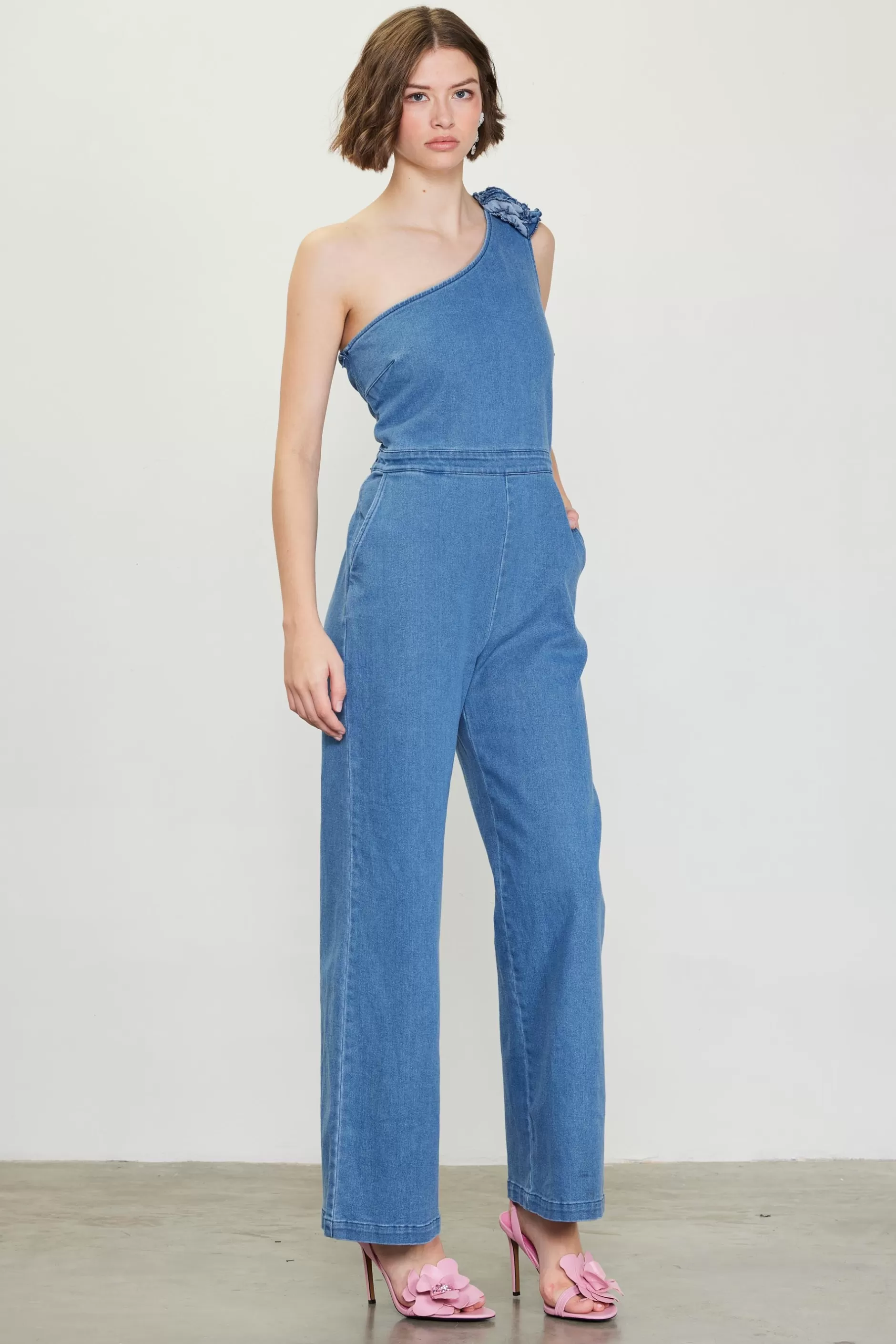 SKIES ARE BLUE One Shoulder Denim Jumpsuit with Rosette